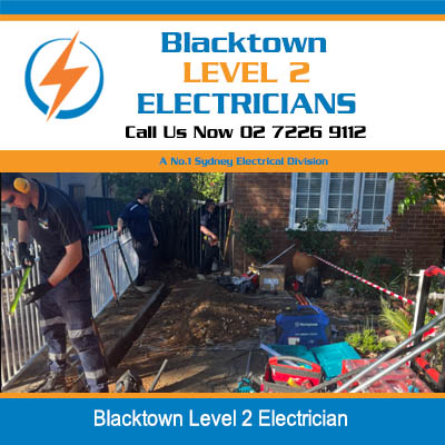 Level 2 electrical work in residential backyard with exposed trenches and equipment in Blacktown