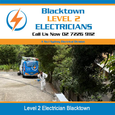 Level 2 electricians utility van parked on residential street in Blacktown
